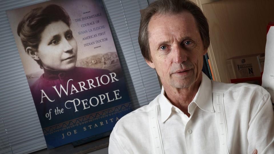 Joe Starita and the cover of " A Warrior of the People "